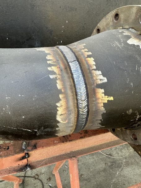 Completed marine pipe weld Completed weld on marine steel pipe