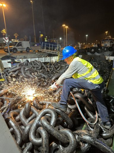 Anchor chain replacement operation on merchant vessel