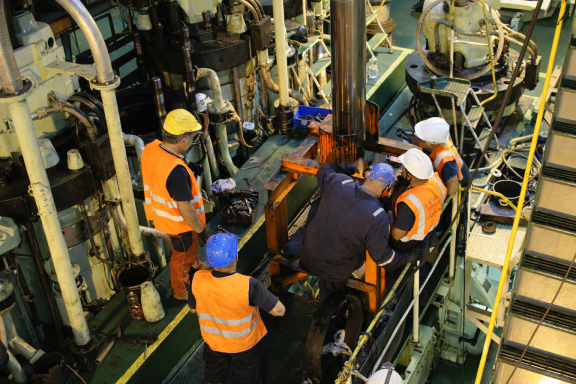 Marine engine component replacement during on-board overhaul